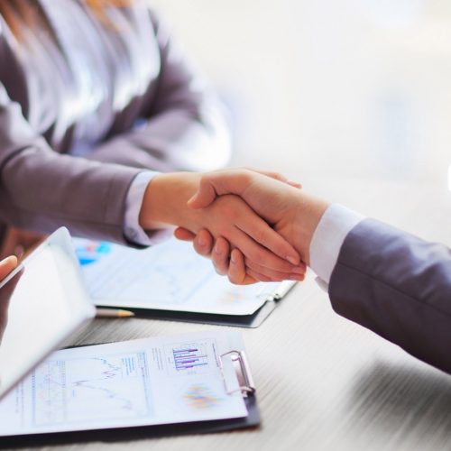 Business people shaking hands